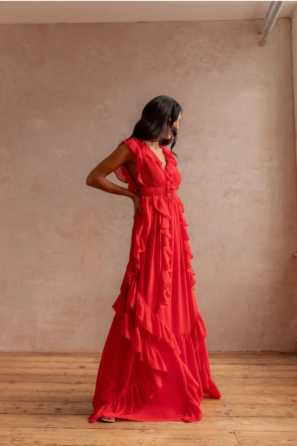 Anne Louise Boutique Senhorita Dress shown on a model, featuring a stylish, elegant design with a fitted bodice and flowing skirt.