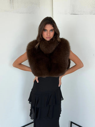 Elegant Emilia cape by Anne Louise Boutique shown in soft fabric with detailed trim and flowing design.