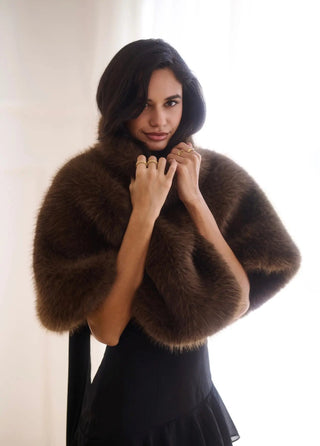 ALB Mortiz Cape shown in soft fabric with a flowing design, featuring a stylish collar and elegant drape.