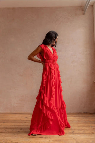 Anne Louise Boutique Senhorita Dress shown on a model, featuring a stylish, elegant design with a fitted bodice and flowing skirt.