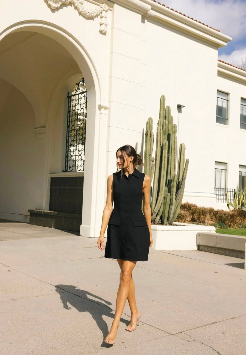 Anne Louise Boutique Porter dress, stylish sleeveless midi with floral patterns and elegant fit, perfect for casual or semi-formal wear.