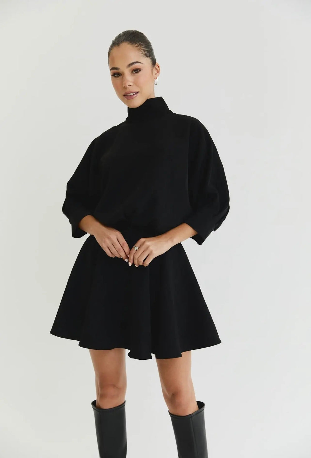 Elegant Denver Dress by Anne Louise Boutique featuring a stylish, flowing design perfect for casual or dressy occasions.