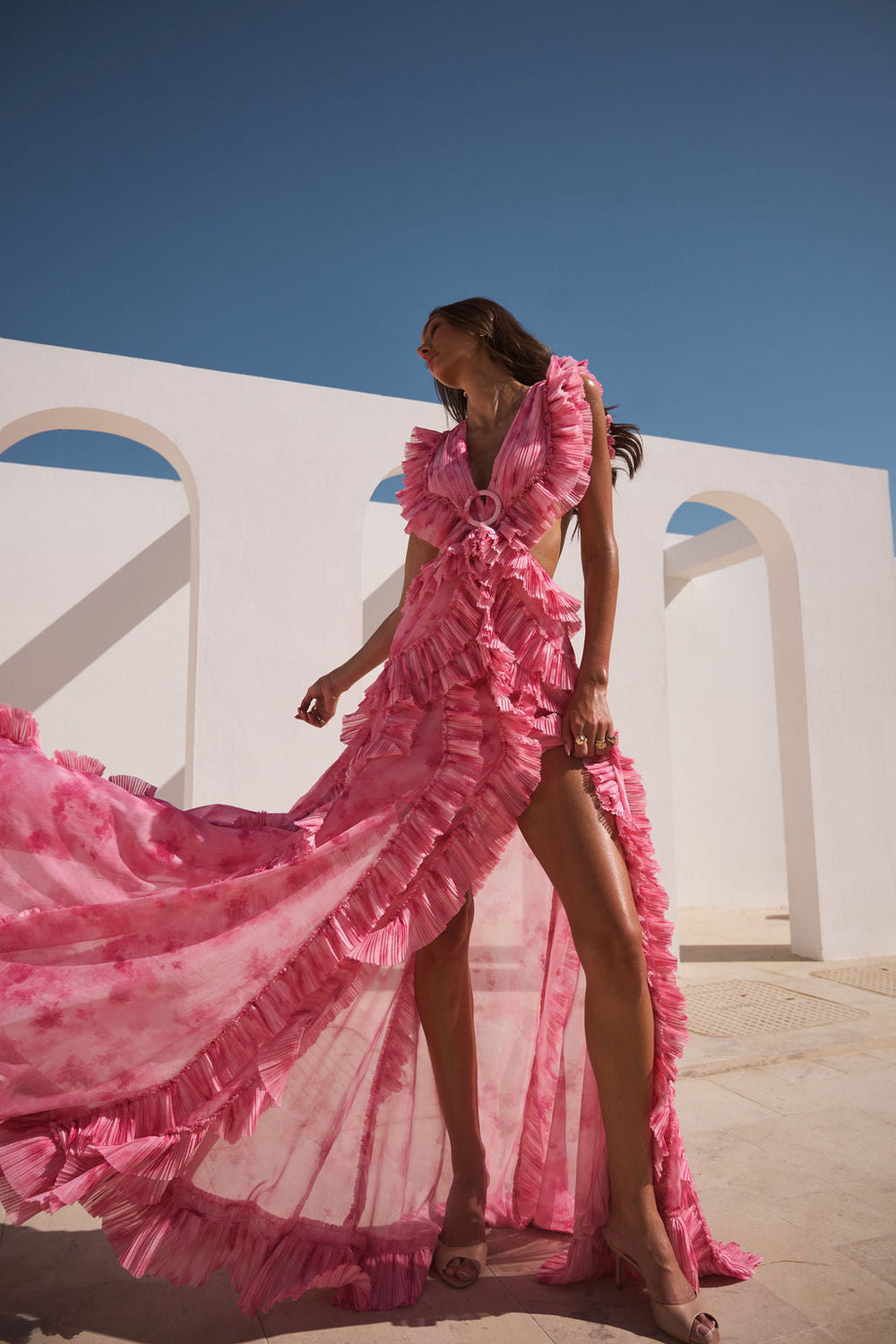 ALB London UK Rose Water Cassini Dress, elegant floral dress with flowing fabric and delicate details, displayed on a hanger.