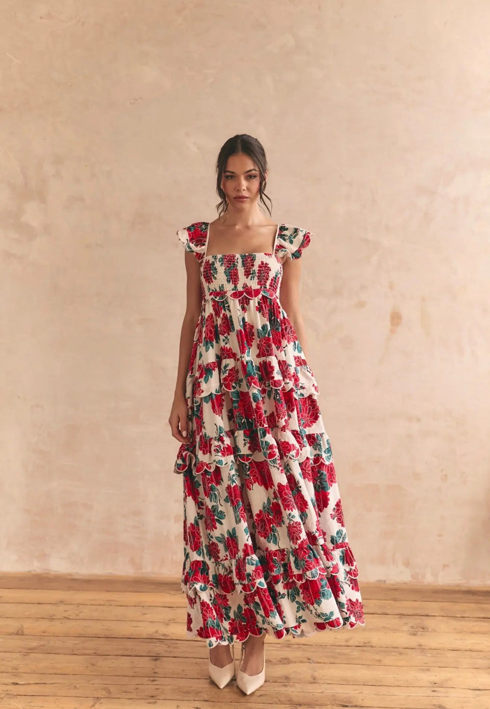 Anne Louise Boutique Monaco Rose Maxi Dress displayed on a model, showcasing its flowing fabric and elegant floral design.