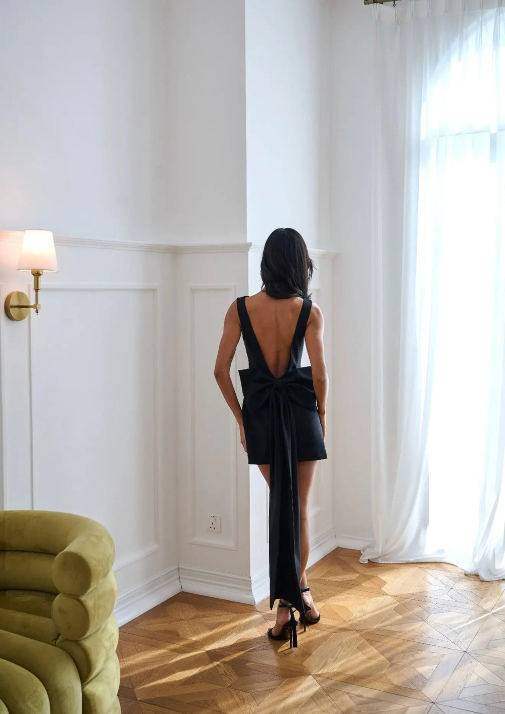 Black bow hair accessory by Anne Louise Boutique featuring a full-size, elegant design with a satin finish.