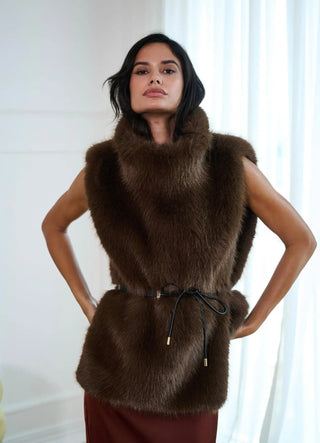 Emilia long cape by Anne Louise Boutique featuring flowing fabric and elegant drape, shown on a model.