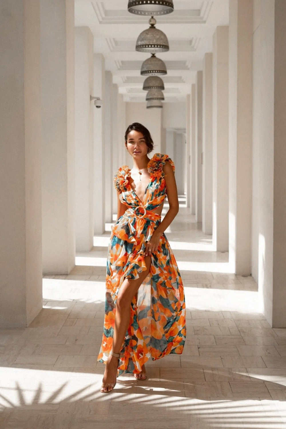 Anne Louise Boutique Calypso Maxi Dress, flowing fabric, vibrant pattern, sleeveless design, perfect for summer or casual occasions.