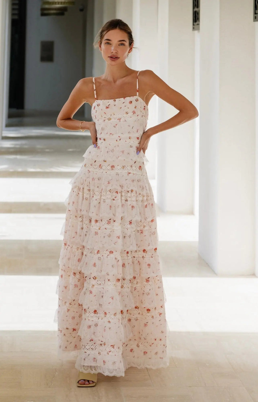 Elegant Lovette Maxi Lace Dress by Anne Louise Boutique featuring intricate lace details and a flowing silhouette.